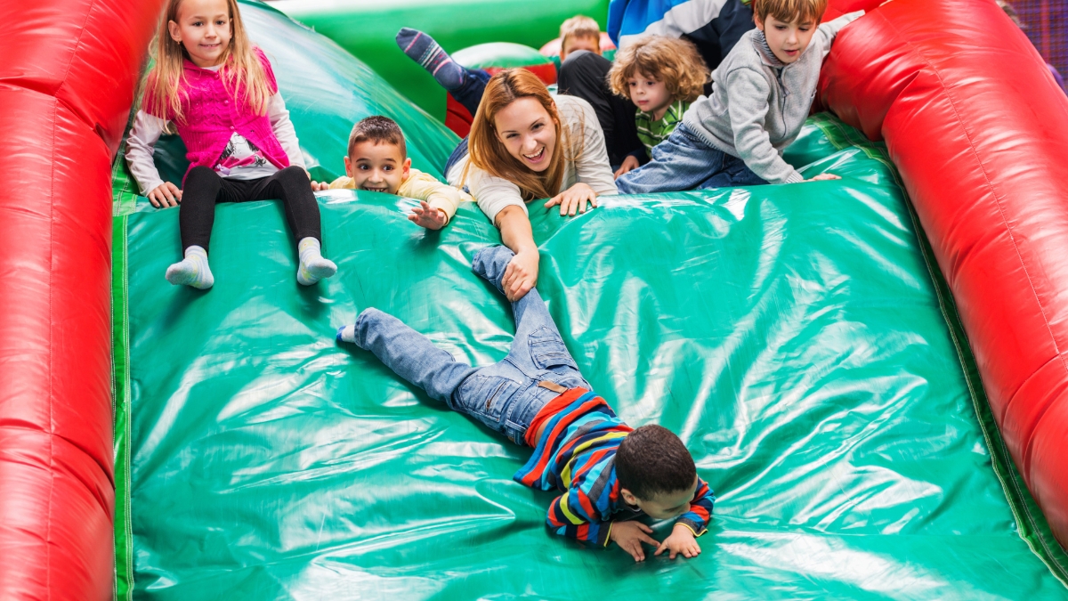 FBSPORT Inflatable Bounce House: Jump, Slide, and Play Without Leaving Home